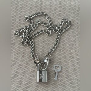 Louis Vuitton Silver Padlock w/ key & 27” Chain to be worn as necklace